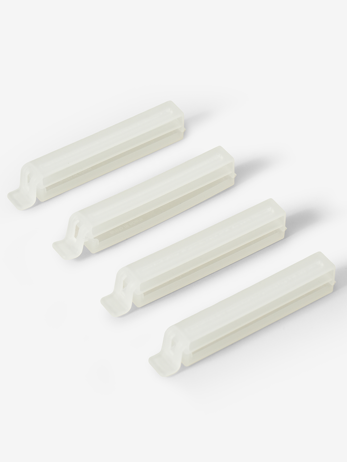 Set of 4 mini-sized, clip-on tube squeezers