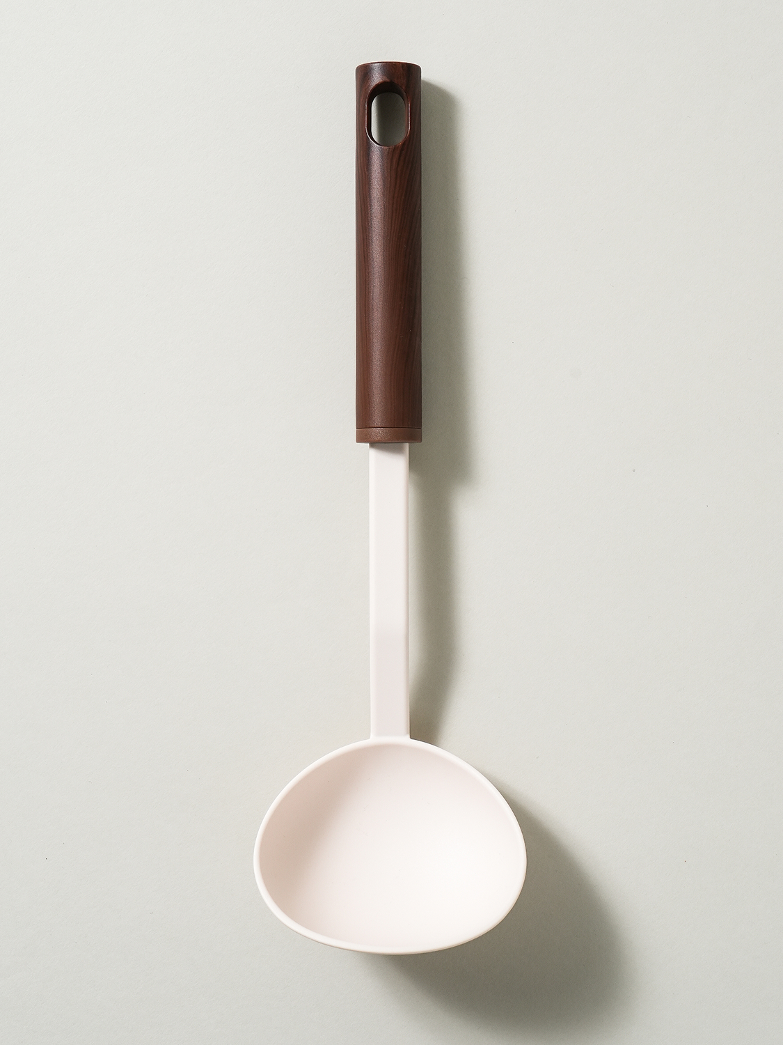 PBT plastic with a wood-grain pattern, used as a scoop or serving utensil.