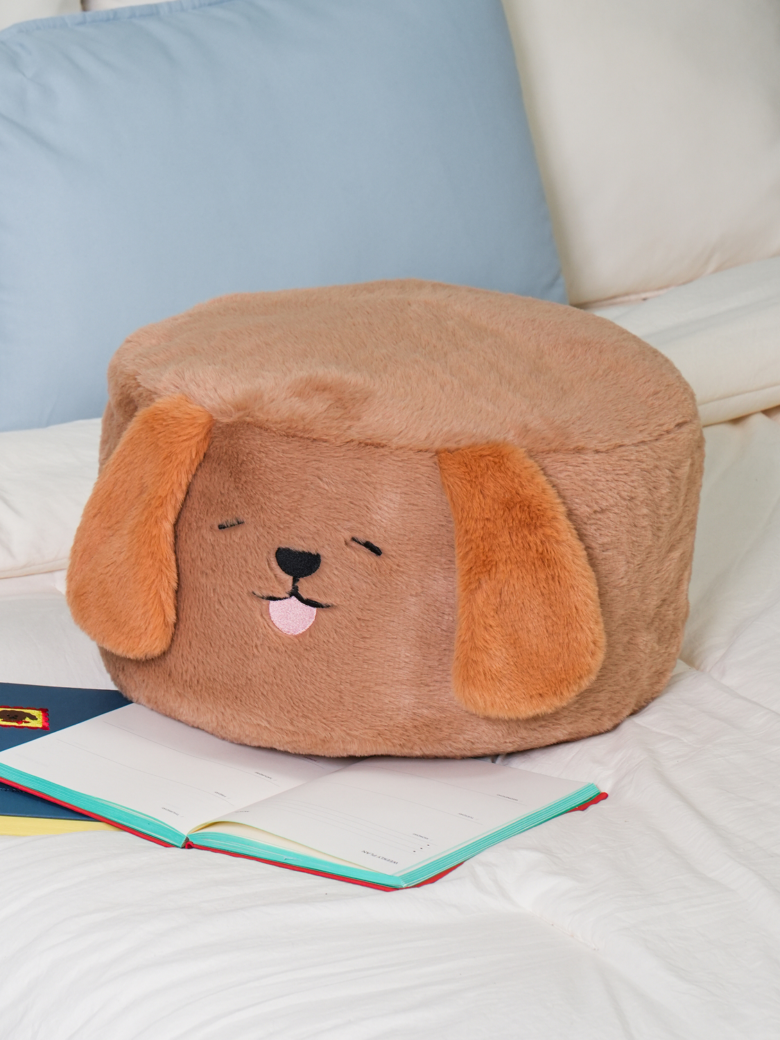Dog-shaped cylinder plush toy