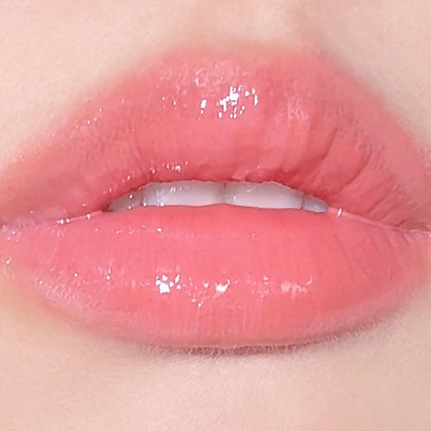 Frillude Dinto La Belle Rose Glass Lip Gloss is a plump, shimmering lip gloss with a dewy glow. It is inspired by Frances Burnett's *The Secret Garden*. Features - Plump, shimmering dewy glow - Color becomes more vivid with each application - Adheres tightly - Long-fitting formula that lasts for a long time - Provides moist shine and hydration to lips Colors (6 shades) 31 Calm Rose - Beige Rose 32 Tender Rose - Vanilla Rose 33 Bitter Rose - Berry Rose 34 Serene Rose - Mute Mauve Rose 35 Shy Rose - Pure Pink Rose (BM pick) 36 Guilty Rose - Cherry Rose Texture Features - Spoon-shaped tip applicator evenly dispenses texture for close adherence to lips - Optimized for volume and shine - Buildable texture that layers clearly without clumping - Contains Provence Rose Extract How to Use ① Pick up the desired amount with the applicator ② Apply from the inner part of the lips outwards to add gloss for a clear, plump lip look Storage Precautions - Due to the nature of the formula, discoloration or pigment separation may occur when exposed to light, so [please avoid] light Caution: Avoid exposure - Due to the nature of the formulation, air bubbles and pigment streaks may be visible on the surface of the product, but this does not indicate a defect in the contents. - The product can be used normally by pumping with the brush. Product Information Notice Product Name: Prilude Dinto La Belle Rose Glass Lip Gloss (31 Calm Rose, 32 Tender Rose, 33 Bitter Rose, 34 Serene Rose, 35 Shy Rose, 36 Guilty Rose) Volume: 5ml Main Product Specifications: Suitable for all skin types Shelf Life: 36 months before opening / 12 months after opening Manufacturer: Cody Co., Ltd. Cosmetic Responsible Distributor: Trendmaker Co., Ltd. Country of Manufacture: South Korea Functional Cosmetic: None Precautions for Use 1. Consult a specialist if you experience any abnormal symptoms or side effects, such as red spots, swelling, or itching on the application area due to direct sunlight during or after using the cosmetic product. 2. Avoid use on areas with wounds. 3. Precautions for Storage and Handling - Keep out of reach of children. - Avoid direct sunlight. Store away from reach of others. Quality Assurance Standards: In the event of a defect in this product, compensation will be provided in accordance with the Consumer Dispute Resolution Standards notified by the Fair Trade Commission. Customer Service Contact: Customer Service 070-4234-4540